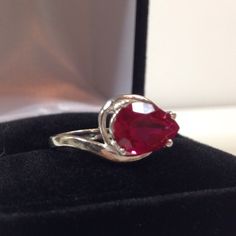 Beautiful Side Set Ruby Ring * 3ct Pear Cut Ruby measures 10mm x 7mm * Premium Comfort Fit Band Shank * Solid Sterling Silver * Sized to order - Select your size Hallmarked & Gift Ready! Matching Pendant Available! This 3ct Ruby is Laboratory Grown. It is identical to natural in every way, including Chemistry, Composition & Hardness with flawless clarity & excellent color refraction. TIMELESS, BEAUTIFUL & UNIQUE FINE ART JEWELRY! Classic Ruby Ring With Pear-shaped Stone, Classic Pear-shaped Ruby Ring, Teardrop Vvs Clarity Rings As Gift, Solitaire Pear-shaped Jewelry For Proposal, Classic Pear-shaped Brilliant Cut Ruby Ring, Formal Teardrop Ruby Ring In Fine Jewelry Style, Teardrop Ruby Ring For Formal Occasions, Formal Teardrop Ruby Ring Fine Jewelry, Pear Shaped Prong Setting Jewelry For Proposal