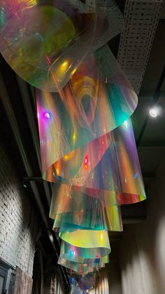 an art installation hanging from the ceiling in a building