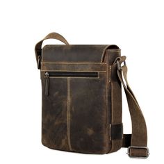 FREE GROUND SHIPPING & FREE MONOGRAMMING!BUFFALO LEATHER RUSTIC HUNTER FINISHThis casual, go-anywhere leather crossbody messenger bag is designed to fit today's active lifestyle. Handmade from buffalo leather with a hunter finish, it builds a rich patina and grows in character as it ages. The bag has vintage styling and camouflage lining with the right amount of space for your mobile devices, tablet, notepads, and charging cords. An open pocket under the flap and a zippered back compartment allo Casual Crossbody Bag, Vintage Styling, Small Messenger Bag, Charging Cord, Buffalo Leather, Crossbody Messenger Bag, E Reader, Crazy Horse, Active Lifestyle