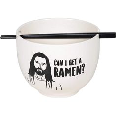 a bowl with chopsticks in it that says can i get a ramen?