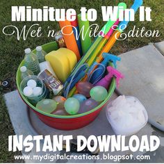 a bucket filled with lots of assorted items on top of a cement slab in the grass