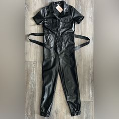 Black Faux Leather. New Fitted Faux Leather Jumpsuits And Rompers For Fall, Fitted Faux Leather Jumpsuits For Fall, Fitted Faux Leather Jumpsuit For Work, Black Halter Jumpsuit, Purple Romper, Chambray Romper, Wide Leg Romper, Sequin Rompers, Ruffle Jumpsuit