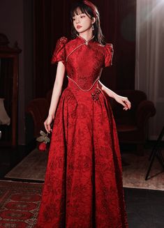 Qipao-inspired Wedding Dress Red Long Sleeve Wedding Dress, Wedding Chinese Dress, High Neck Wedding Dress With Fitted Bodice, Red Short Sleeve Wedding Dress, Red Fitted Brocade Dress, Spring Ceremony Fitted Cheongsam, Red Brocade Wedding Dress, Red Brocade Party Dress, Elegant Stand Collar Wedding Dress