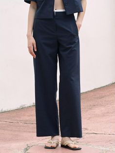 This is a trendy and feminine pants by kuho plus that is made out of high quality and sturdy material. With distinctive mood of the design and comfortable wear, you can style it for your casual daily outfit.- Color detail on the waist- Set up with matching jacket- Feminine, romantic, and casual mood Elegant Navy Bottoms For Fall, Navy High-waisted Cotton Pants, Navy Pants For Business Casual In Spring, Chic Navy Bottoms For Fall, Elegant Navy Ankle-length Pants, Navy High-waisted Pants For Business Casual, Navy Cotton Ankle-length Pants, Modern Blue Wide-leg Pants, Chic Navy Straight Leg Pants