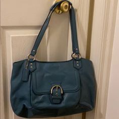 Beautiful Rare Color Leather Coach Hand Bag. Excellent Condition. Some Makeup Stains Inside Of Hand Bag. Blue Top Handle Shoulder Bag With Silver-tone Hardware, Blue Shoulder Bag With Silver-tone Hardware And Top Handle, Blue Satchel With Silver-tone Hardware And Double Handle, Blue Satchel Shoulder Bag With Silver-tone Hardware, Chic Blue Satchel With Silver-tone Hardware, Blue Shoulder Bag With Silver-tone Hardware, Blue Bags With Silver-tone Hardware For Daily Use, Blue Shoulder Bag With Gold-tone Hardware For Office, Chic Blue Shoulder Bag With Silver-tone Hardware