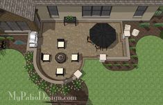 an aerial view of a backyard with patio furniture