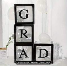 three black and white blocks with letters spelling out the letter g, r, d