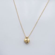 Embrace elegance and love with our Dome Heart Lock Pendant Necklace, beautifully crafted from 10k solid gold. This enchanting piece combines timeless sophistication with a symbol of affection, making it the perfect expression of cherished emotions. Necklace Length: 16"Pendant size: 10 x 12 mm 14k Gold Polished Heart Pendant Necklace, Adjustable Gold-plated Heart Pendant Necklace, Delicate 14k Gold-filled Heart Pendant Necklace, 14k Gold Heart Pendant Chain Necklace, Tarnish Resistant, Elegant 14k Gold-filled Heart Pendant Necklace, Heart Lock, 10k Gold, Solid Gold, Necklace Lengths