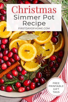 a pot filled with cranberries, oranges and cinnamon on top of a table