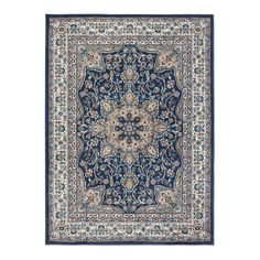 a blue and beige rug with an ornate design on the center, in front of a white background