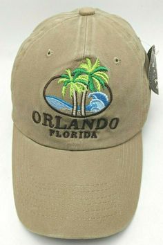 This is a nice ORLANDO, FLORIDA brown adjustable hat / cap  *NEW* Features: - "ORLANDO, FLORIDA" embroidered on front - Slightly curved brim - 100% cotton - Adjustable strap fits most heads Condition notes: New, unworn condition with tags. Clean inside and out. Please look at the photos for more details. I pack carefully and ship quickly.  Have any questions?  Please ask. Brown Curved Bill Hat With Embroidered Logo, Adjustable Beach Baseball Cap With Embroidered Logo, Casual Vacation Hats With Embroidered Logo, Khaki Curved Brim Hat With Embroidered Logo, Khaki Hat With Embroidered Logo And Curved Brim, Brown Trucker Hat With Embroidered Logo, Brown Embroidered Baseball Cap With Curved Brim, Brown Embroidered Snapback Baseball Cap, Brown Embroidered Curved Brim Baseball Cap