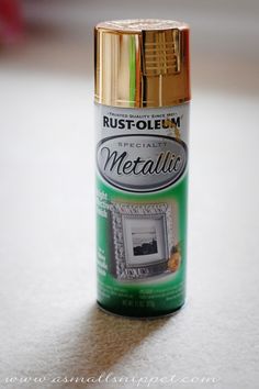 a can of rust - oleeum metallic paint sitting on a countertop next to a wall