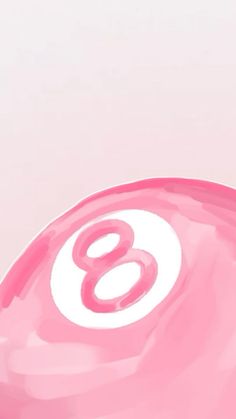 a pink object with the number eight painted on it's side and in the center