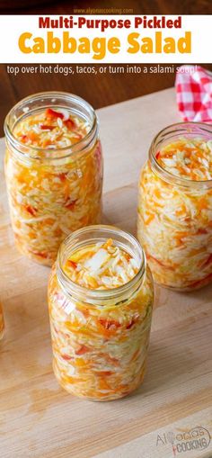 three jars filled with food sitting on top of a wooden cutting board