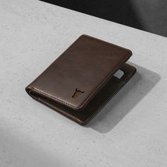 Handcrafted from Genuine Top Grain USA Leather, the TORRO slim bifold leather wallet is ideal for the men/women who seeks to be smart, stylish and practical. Featuring a total of 5 credit/debit card slots, including two hidden pockets for extra storage of cards and cash, our wallet is true blend of form, function and versatility. Equipped with RFID blocking which effectively protects your cards from electronic theft. Presented in a TORRO gift box, it is pleasure to both give and receive. Cheap Business Wallets With Rfid Blocking, Cheap Minimalist Card Holder With Rfid Blocking, Cheap Men's Wallets With Card Slots, Cheap Everyday Card Holder With Rfid Blocking, Cheap Men's Card Holder For Personal Use, Luxury Rfid Blocking Wallets For Daily Use, Cheap Rfid Blocking Card Holder For Everyday, Cheap Rfid Blocking Card Holder For Formal Use, Cheap Men's Rectangular Card Holder