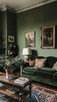 a living room with green walls and furniture