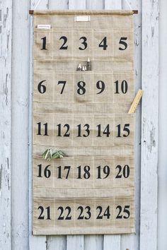 a burlap sign with numbers on it