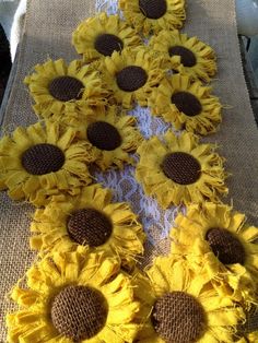 sunflowers are laid out on a table