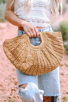 A must-have handbag for those sunny days and beyond. Crafted with natural raffia material, this curved handbag exudes a charming and stylish appeal that's sure to elevate your summer look. Chic and On-Trend: Our Half-Moon Straw Bag features a curved design that adds a touch of modernity and elegance to your outfit. Stay on-trend with this fashionable and eye-catching handbag that complements your style flawlessly. Eco-Friendly Raffia Material: Embrace the beauty of nature with this handbag, as i Straw Beach Tote, Seasons Activities, Vacation Bag, Braid Designs, Brown Handbag, Circle Shape, Beach Tote, Vacation Beach, Brown Fashion