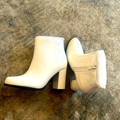 Allegra Brand White Booties With Side Zipper White Synthetic Closed Toe Booties, White Pointed Toe Booties For Winter, White Pointed Toe Winter Booties, Trendy White Winter Booties, White Ankle-high Winter Booties, White Synthetic Ankle Boot Heels, White Winter Booties With Reinforced Heel, White Synthetic Boots For Formal Occasions, White Closed Toe Booties With Medium Width