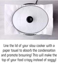 a roll of toilet paper sitting on top of a counter next to a black and white photo