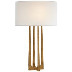 a table lamp with a white shade on it's base and gold metal legs