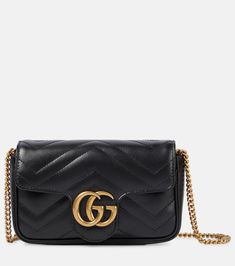 GG Marmont Supermini shoulder bag in black - Gucci | Mytheresa Gg Marmont Mini, Ellie Goulding, Gucci Gg Marmont, Salma Hayek, Online Shopping For Women, Gucci Bags, Leather Chain