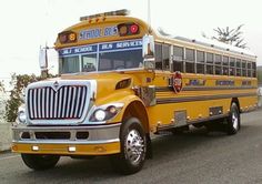 a school bus is parked on the side of the road