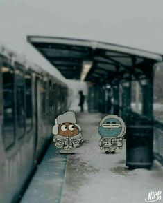 two cartoon characters are standing next to a train in the snow, one is wearing a hat