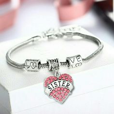 This Is A Crystal Rhinestone Bracelet That Has A Heart Shaped Pendent With The Word Sister Inscribed. Two Other Pieces Around The Bracelet Make Up The Word Love. Comes With A Multi Hook Attachment So You Can Wear Tightly Or Loosely. Pandora Bracelet Charms Ideas, The Word Love, Sister Bracelet, Word Love, Bracelet Charms, Pandora Bracelet Charms, Rhinestone Bracelet, Pandora Bracelet, A Heart