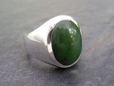 Mens Heavy Oval Nephrite Jade Ring in Sterling Silver Jade Rings With Polished Finish, Oval Cabochon, Jade Rings With Polished Finish In Oval Cabochon Shape, Oval Cabochon Jade Rings With Polished Finish, Jade Oval Cabochon Rings With Polished Finish, Classic Jade Rings With Polished Finish, Modern Oval Jade Ring, Mens Rings For Sale, Jade Rings, Men's Wedding Bands