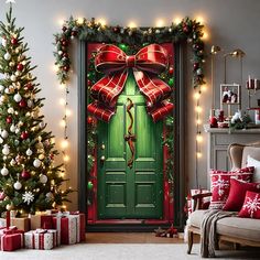 a decorated christmas tree in front of a green door