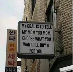 a sign that says, my goal is to tell my mom'go mom, choose what you want, i'll buy it for you