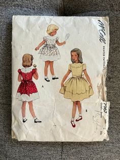 "Vintage Sewing Pattern McCall's 7967 ca. 1950's Toddler girls' short sleeved dress. Size 2, breast 21\". Pattern has been cut out, but is complete. Envelope has wear. From a smoke-free home." 50s Patterns, Short Puffy Sleeves, Sewing Vintage, 1950 Fashion, Girl Dress Patterns, Mccalls Sewing Patterns, Couture Vintage, Girls Party Dress, Puffy Sleeves