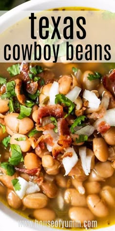 a white bowl filled with beans, bacon and cilantro on top of a table