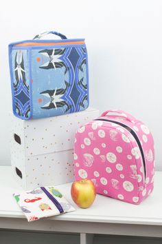 "These insulated lunch bags are the perfect break to the day! Included in the pattern are two different styles of lunch bags(a rounded lunch bag for the intermediate sewist, and a top zip lunch bag for the advanced sewist). Whether you make them for a child or an adult, they are just the right size to fit a sandwich, several snacks, and a drink. Also included in the instructions are zippered snack bags in two different sizes - one for snacks, and another for a sandwich! The pdf pattern includes Sew Sweetness, Sewing Instructions, Sac Lunch, Metallic Purse, Patchwork Bags, Craft Bags, Snack Bags, Insulated Lunch Bags, Lunch Bags