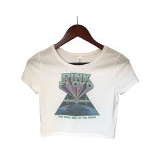 This faded distressed Pink Floyd Dark Side of the Moon top is perfect to dress up or wear casual. The image is sublimated onto the material making the top buttery soft! Fabrication: 52% Airlume combed and ring-spun cotton 48% poly, 40 single 3.6 oz. Pink Floyd Dark Side of the Moon Vintage Retro Distressed Crop Top, Short Sleeve Crop Top, Boho Hippie Clothing, 90s Fashion, Crop Top for Women Plus Size Aesthetic Outfits, Dark Side Of The Moon, Moon Top, Pink Floyd Dark Side, Cropped Tops, Boho Hippie, Short Sleeve Cropped Top, Hippie Outfits, Pink Floyd