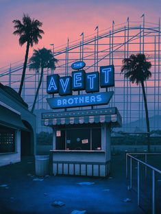 the avett brothers sign is lit up at dusk with palm trees in the background