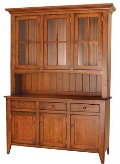 a wooden china cabinet with glass doors on the top and bottom, against a white background