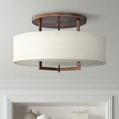 a light fixture hanging from the ceiling in a living room