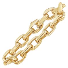 A classic and distinct bracelet showcasing large oval links made in solid 18 karats yellow gold. Bracelet weighs 35.87 grams. Approximately 8.5 inches in Length. Gold Cuban Link Chain, Rings Luxury, Modern Bracelets, Gold Link Bracelet, Classic Bracelets, Simple Bracelets, Metal Chain Link, Yellow Gold Bracelet, Cuban Link Chain