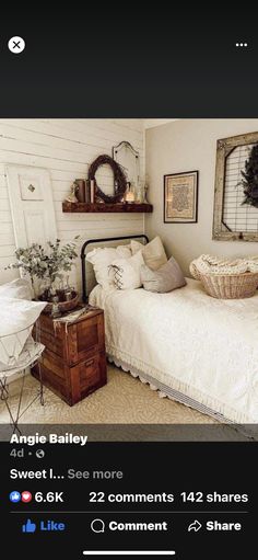 a bed room with a neatly made bed and pictures on the wall