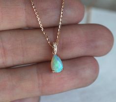 Gorgeous teardrop opal & diamond necklace. Such a pretty gift for her; your mom, wife, daughter ... This crystal gemstone necklace is a available in 14k/18k rose/white/yellow gold- please select metal from drop down menu. Price is for a length of 15 to 17 inches. If you wish a longer one, there is some extra fee. If you would like to have other gemstones instead of diamonds/opals please contact us before purchase regarding pricing. Item details: 14k/18k/rose white yellow gold 8x5mm Australia Frozen Jewelry, Red Stone Necklace, October Birthstone Necklace, Fire Opal Necklace, Opal Pendant Necklace, Gold Name Necklace, Garnet Necklace, Buy Necklace, Pretty Gift