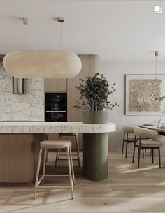 a modern kitchen with marble counter tops and wooden stools next to a dining room table