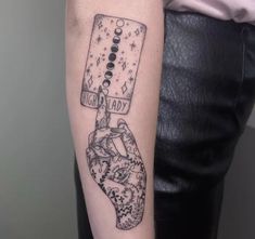 a person with a tattoo on their arm