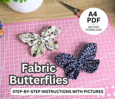 the instructions for how to make fabric butterflies are displayed on a cutting board with scissors