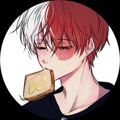 a man with red hair and glasses is holding a piece of bread in his mouth