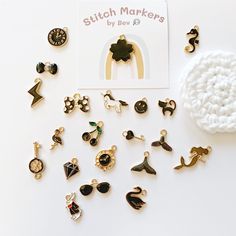 a bunch of earrings sitting on top of a white table