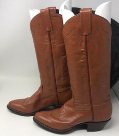 "13 1/3\" in height,pull on straps,good condition/smoke free environment/Labeleda size 5B(107)" Southwestern Style Round Toe Boots For Ranch, Southwestern Style Boots With Round Toe For Western Events, Western Moto Boots For Winter Ranch, Western Style Moto Boots For Winter Ranch, Western Brown Mid-calf Heeled Boots, Brown Western Mid-calf Heeled Boots, Brown Mid-calf Western Heeled Boots, Western Style Knee-high Boots For Rodeo, Southwestern Snip Toe Boots For Ranch