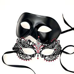 Both masquerade masks come in black. A classic design for men while the woman's mask is specially designed to look sheen with embedded rhinestones.